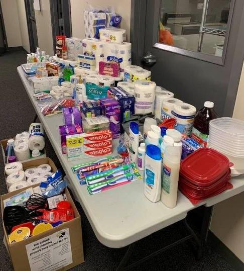 variety of kitchen & toiletry items on table